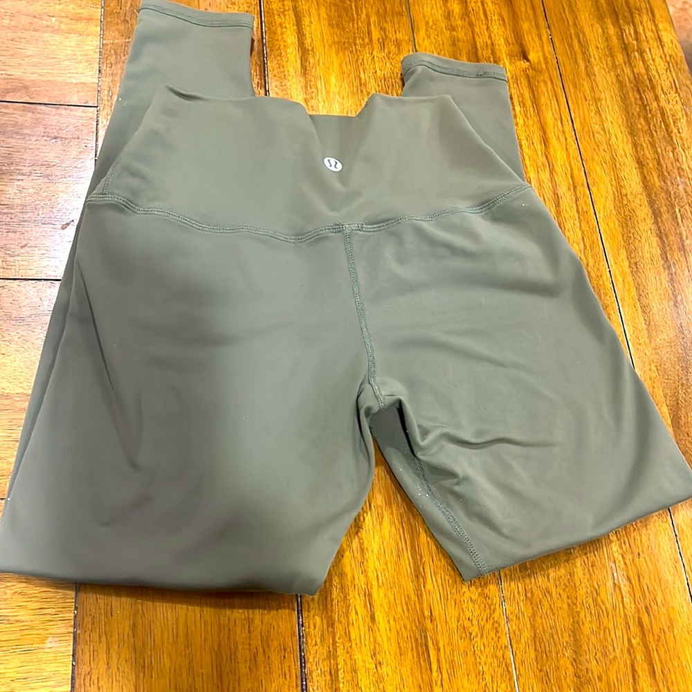 Lululemon army green leggings . Large.